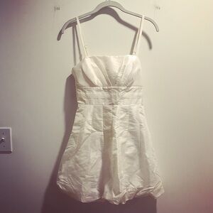 White nylon baby doll tank dress with bubble hem